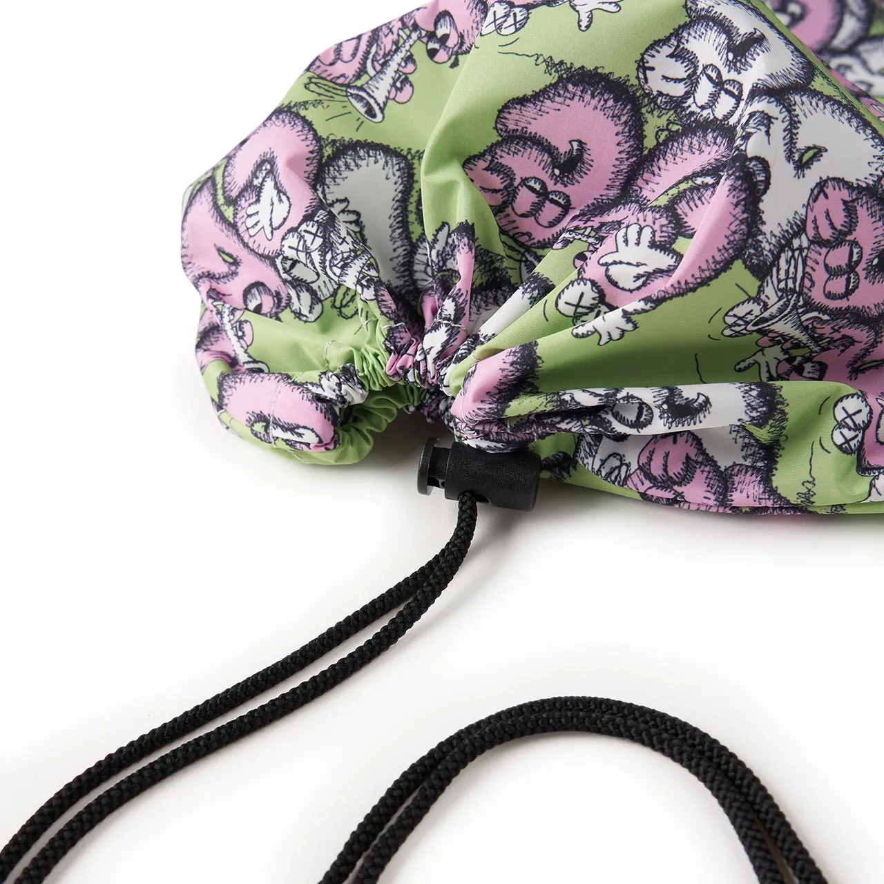 comme des garçons shirt x kaws drawstring bag